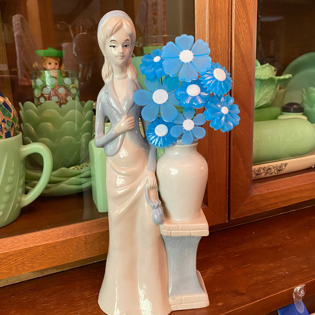 Lady in Blue with Flowers