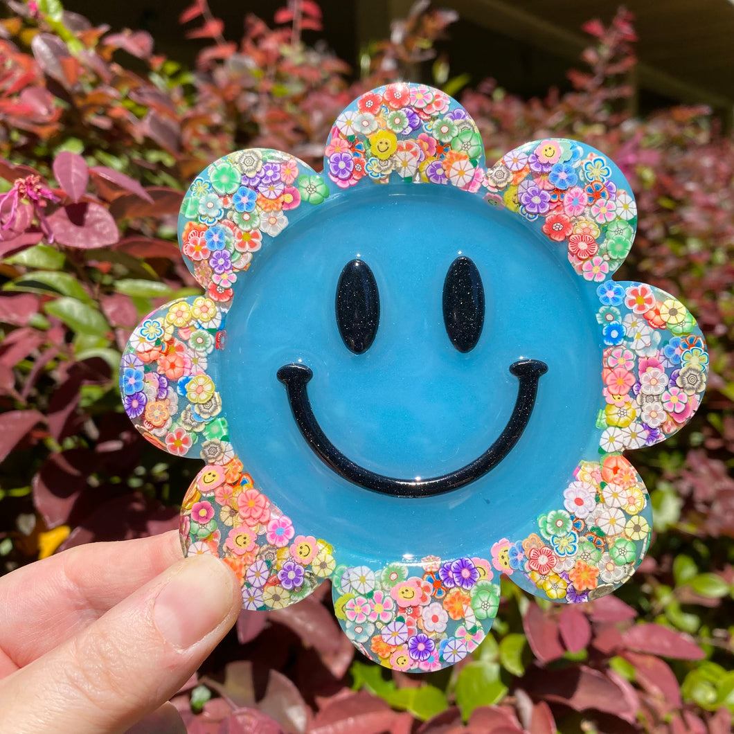 Blue Smiley Face with Flowers